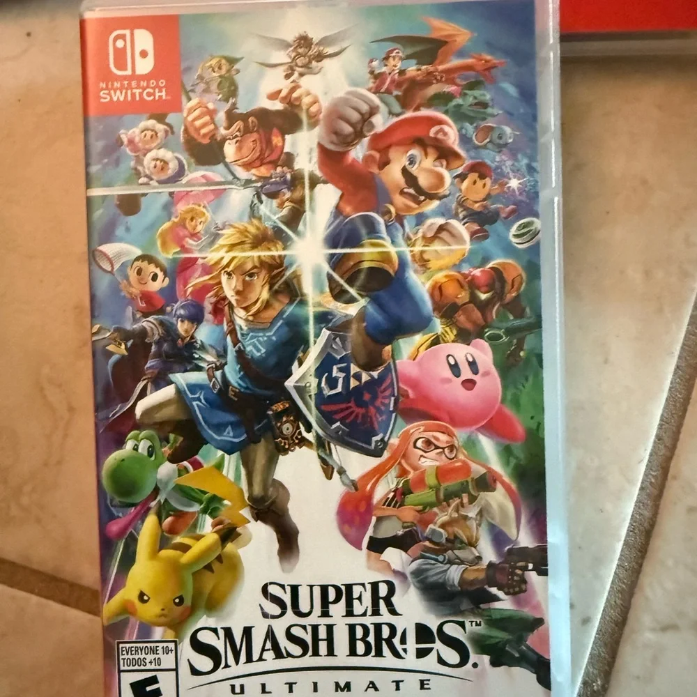 Complete Nintendo Switch system with Red and Blue Joy-Con Controllers